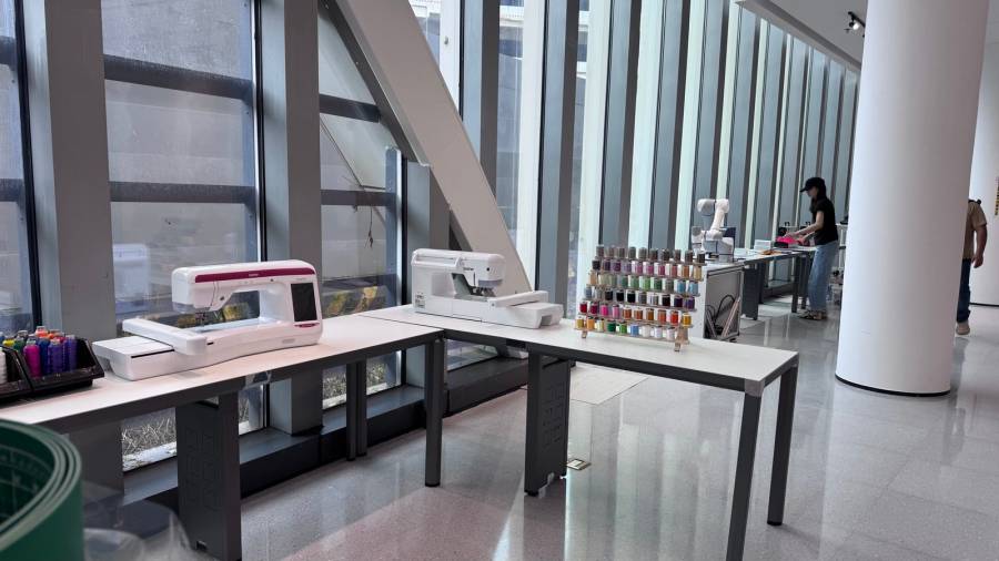 OpenLab: embroidery machines and thread wall in the new space
